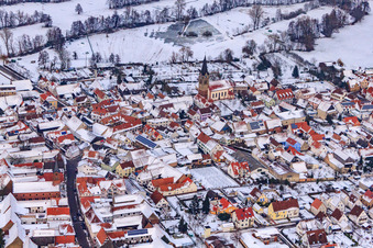 Kreuzgasse in the snow in Steinweiler in the state Rhineland-Palatinate, Germany