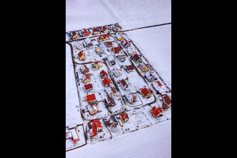 New development area Brotäcker in snow in Steinweiler in the state Rhineland-Palatinate, Germany from above