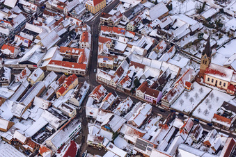 Main Street x Ring Road in snow in Steinweiler in the state Rhineland-Palatinate, Germany