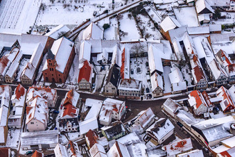 Aerial photograpy of Kreuzgasse in the snow in Steinweiler in the state Rhineland-Palatinate, Germany