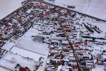 Obergasse in snow in Steinweiler in the state Rhineland-Palatinate, Germany