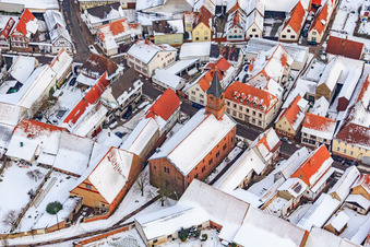 Oblique view of Protest. Church in the snow in Steinweiler in the state Rhineland-Palatinate, Germany