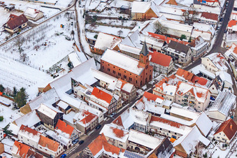 Protest. Church in the snow in Steinweiler in the state Rhineland-Palatinate, Germany out of the air