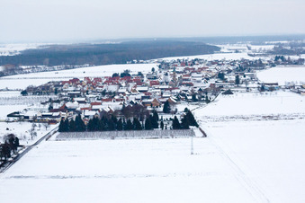Aerial view of In winter with snow from the west in Erlenbach bei Kandel in the state Rhineland-Palatinate, Germany