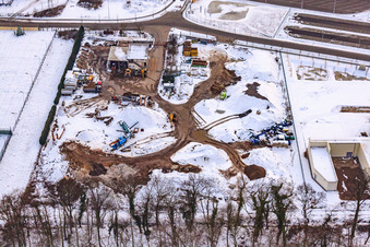 Construction waste recycling Gaudier earthworks and demolition in snow in the district Minderslachen in Kandel in the state Rhineland-Palatinate, Germany