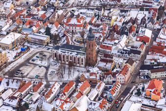 Aerial view of Market square, church in snow in Kandel in the state Rhineland-Palatinate, Germany