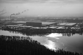 Mercedes plant behind the Old Rhine in winter in Wörth am Rhein in the state Rhineland-Palatinate, Germany
