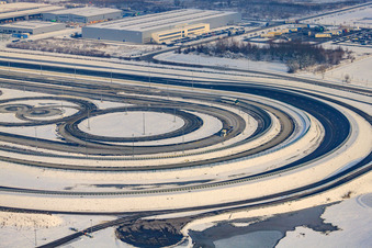 Aerial view of Oberwald industrial area, Daimler truck test track in winter with snow in Wörth am Rhein in the state Rhineland-Palatinate, Germany