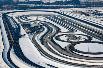 Wintry snowy Racecourse of the Daimler truck testing course in the district Industriegebiet Woerth-Oberwald in Woerth am Rhein in the state Rhineland-Palatinate, Germany
