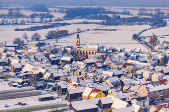 Town center in winter with snow in Neupotz in the state Rhineland-Palatinate, Germany