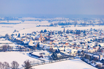 Aerial view of Town center in winter with snow in Neupotz in the state Rhineland-Palatinate, Germany