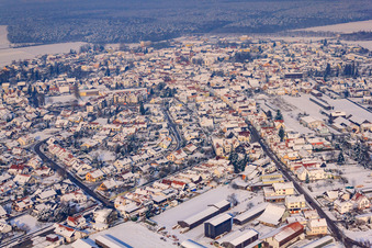 View of the town from the south in winter with snow in Rheinzabern in the state Rhineland-Palatinate, Germany