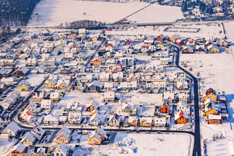 Aerial view of New development area In den Tongruben from the east in winter with snow in Rheinzabern in the state Rhineland-Palatinate, Germany