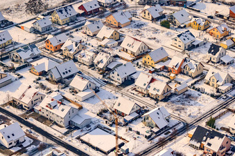Konrad-Zuse-Straße in winter with snow in Rheinzabern in the state Rhineland-Palatinate, Germany