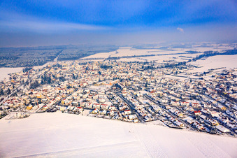 Aerial view of View of the town from the south in winter with snow in Rheinzabern in the state Rhineland-Palatinate, Germany