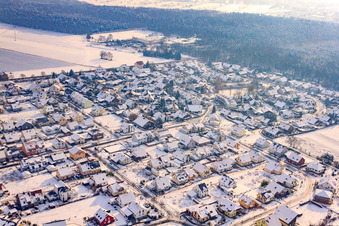 New development area in the clay pits from the northwest in winter with snow in Rheinzabern in the state Rhineland-Palatinate, Germany