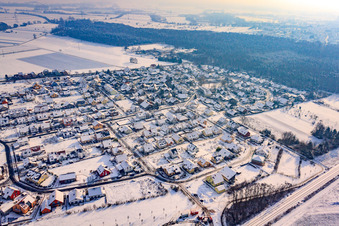Aerial view of New development area in the clay pits from the northwest in winter with snow in Rheinzabern in the state Rhineland-Palatinate, Germany