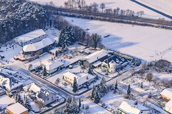 Aerial view of Industrial road in winter with snow in Rheinzabern in the state Rhineland-Palatinate, Germany