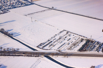 Course of the Erlenbach in winter with snow in Hatzenbühl in the state Rhineland-Palatinate, Germany