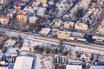 Aerial view of Train station in winter with snow in Kandel in the state Rhineland-Palatinate, Germany