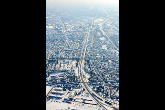 Rheinbrückenstr in winter with snow in the district Knielingen in Karlsruhe in the state Baden-Wuerttemberg, Germany