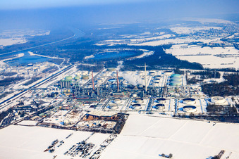 Oblique view of MIRO refinery in winter with snow in the district Knielingen in Karlsruhe in the state Baden-Wuerttemberg, Germany