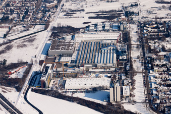 Wintry snowy Building and production halls on the premises of the chemical manufacturers L'OREAL Produktion Deutschland GmbH & Co. KG in the district Nordweststadt in Karlsruhe in the state Baden-Wurttemberg, Germany