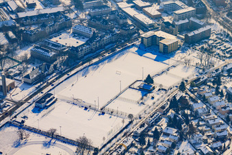 Aerial view of Sports fields of the sports community Karlsruhe in winter when there is snow in the district Nordweststadt in Karlsruhe in the state Baden-Wuerttemberg, Germany
