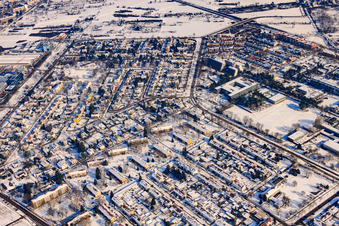 Humboldt Gymnasium and apartment blocks on Dürheimer Straße in winter with snow in the district Nordweststadt in Karlsruhe in the state Baden-Wuerttemberg, Germany