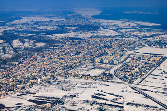 View of the town from the southwest in winter with snow in the district Neureut in Karlsruhe in the state Baden-Wuerttemberg, Germany