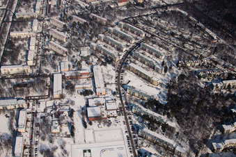 Oblique view of Tennesseeallee in winter with snow in the district Nordstadt in Karlsruhe in the state Baden-Wuerttemberg, Germany