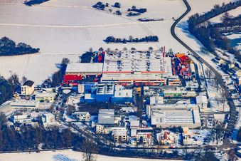 Aerial view of Coca Cola at the quarry lake in winter with snow in the district Neureut in Karlsruhe in the state Baden-Wuerttemberg, Germany