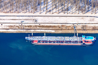 Aerial view of Oil port in winter with snow in the district Knielingen in Karlsruhe in the state Baden-Wuerttemberg, Germany
