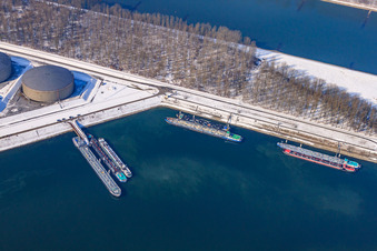 Aerial photograpy of Oil port in winter with snow in the district Knielingen in Karlsruhe in the state Baden-Wuerttemberg, Germany
