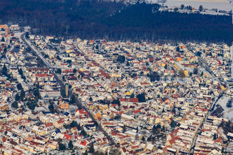 Aerial view of Maximilanstraße in winter with snow in Jockgrim in the state Rhineland-Palatinate, Germany