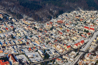 Hatzenbühler Straße in winter with snow in Jockgrim in the state Rhineland-Palatinate, Germany