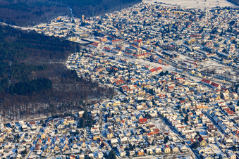 Aerial view of Marienstraße in winter with snow in Jockgrim in the state Rhineland-Palatinate, Germany