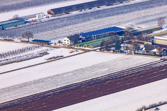 Aerial view of Zapf farm market in winter with snow in Kandel in the state Rhineland-Palatinate, Germany