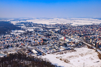 City view with railway line from the southeast in winter with snow in Kandel in the state Rhineland-Palatinate, Germany