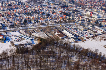 Lauterburger Straße commercial area in winter with snow in Kandel in the state Rhineland-Palatinate, Germany