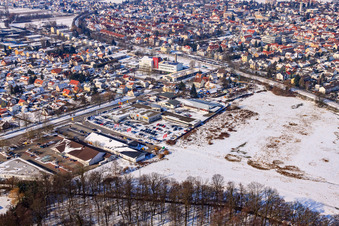 Aerial view of Lauterburger Straße commercial area in winter with snow in Kandel in the state Rhineland-Palatinate, Germany