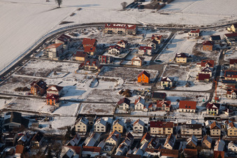 On the high trail in winter with snow in Kandel in the state Rhineland-Palatinate, Germany from the plane