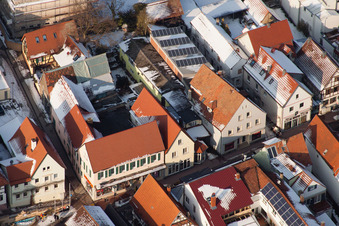 Aerial photograpy of Schulgasse x Hauptstraße in winter with snow in Kandel in the state Rhineland-Palatinate, Germany