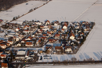 Roman road in winter with snow in the district Minderslachen in Kandel in the state Rhineland-Palatinate, Germany