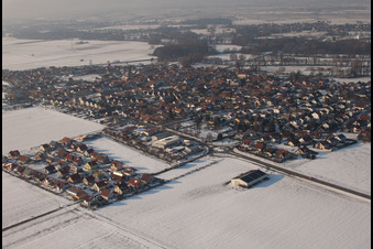 Brotäckerstraße in winter with snow in Steinweiler in the state Rhineland-Palatinate, Germany