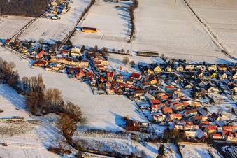 Aerial photograpy of Niedergasse in the snow in Steinweiler in the state Rhineland-Palatinate, Germany