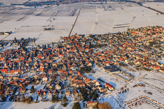 Insheimer Straße in winter with snow in Rohrbach in the state Rhineland-Palatinate, Germany