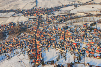 Obergasse from the south in winter with snow in the district Ingenheim in Billigheim-Ingenheim in the state Rhineland-Palatinate, Germany