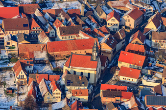 Protest. Church in the snow in Göcklingen in the state Rhineland-Palatinate, Germany