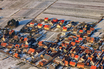 New development area AM Kieselberg in winter with snow in Göcklingen in the state Rhineland-Palatinate, Germany